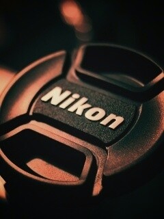 Крышечка от объектива Nikon обои