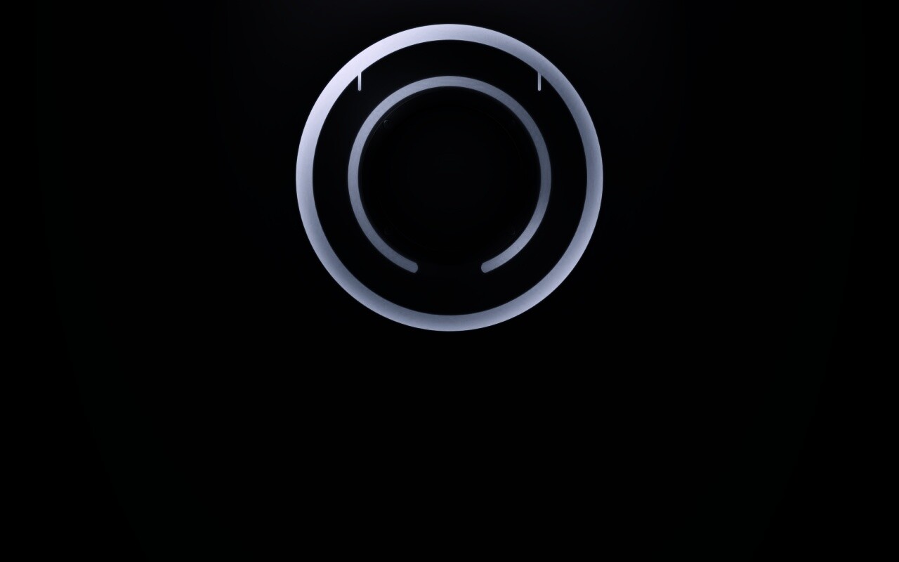 Диск из Tron на черном фоне обои