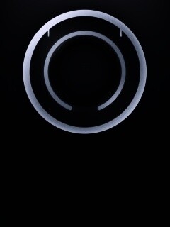Диск из Tron на черном фоне обои