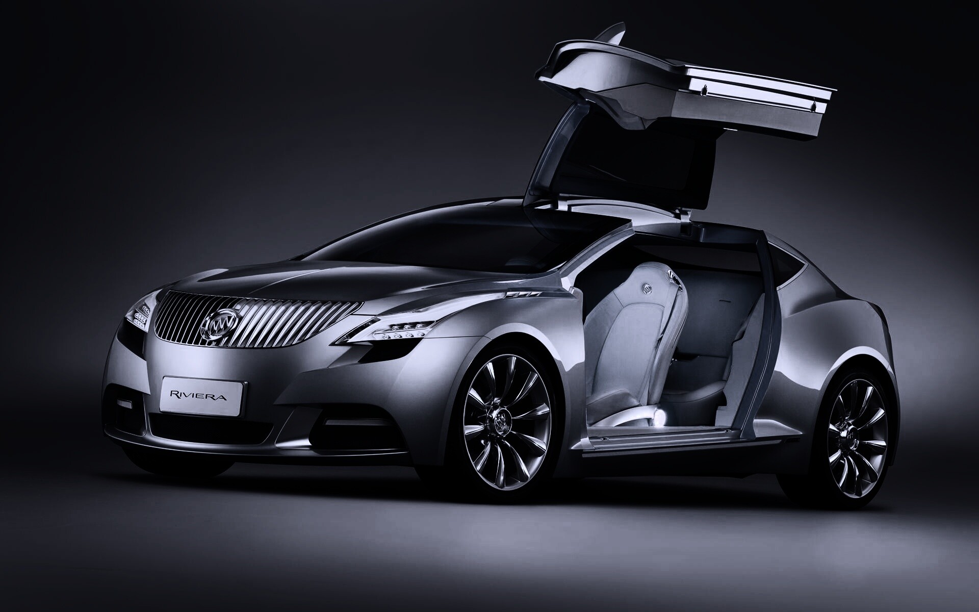 Buick Riviera с распахнутой дверцей обои