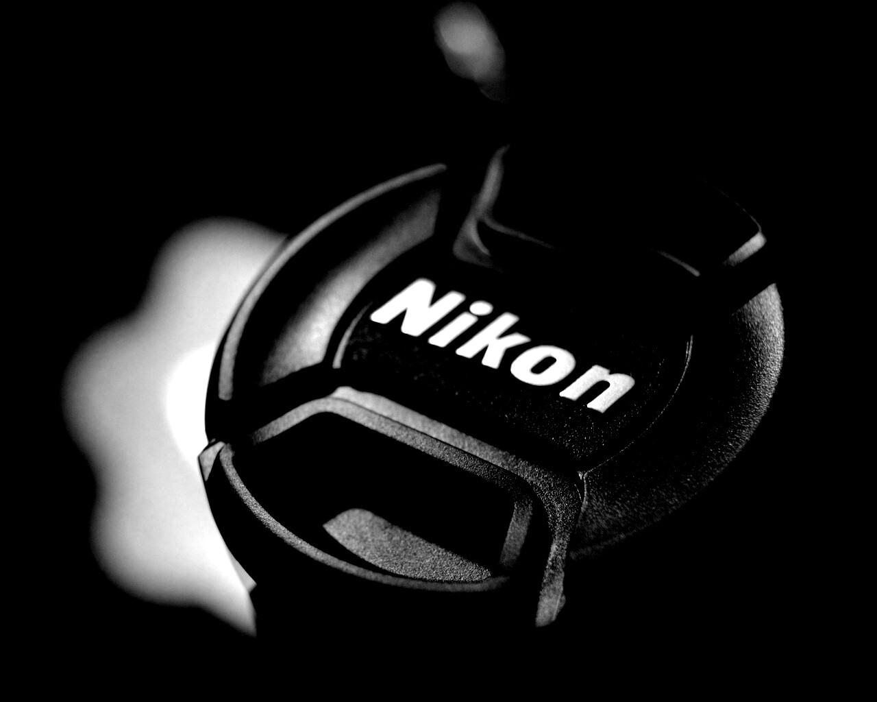 Крышечка от объектива Nikon обои