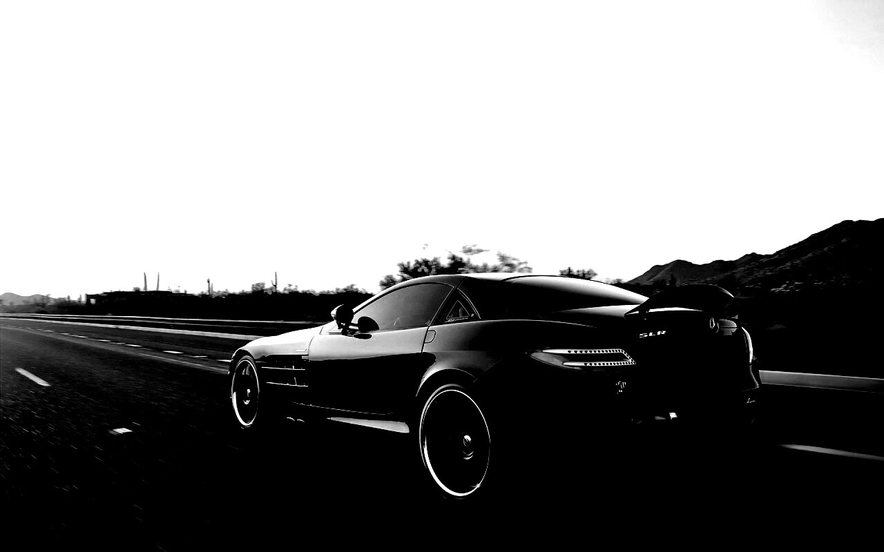 Черный автомобиль уезжает в закат обои