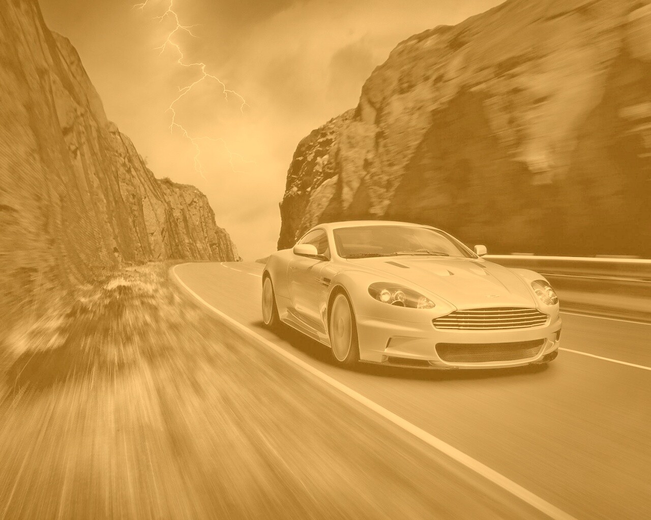 Астон мартин на горной дороге обои
