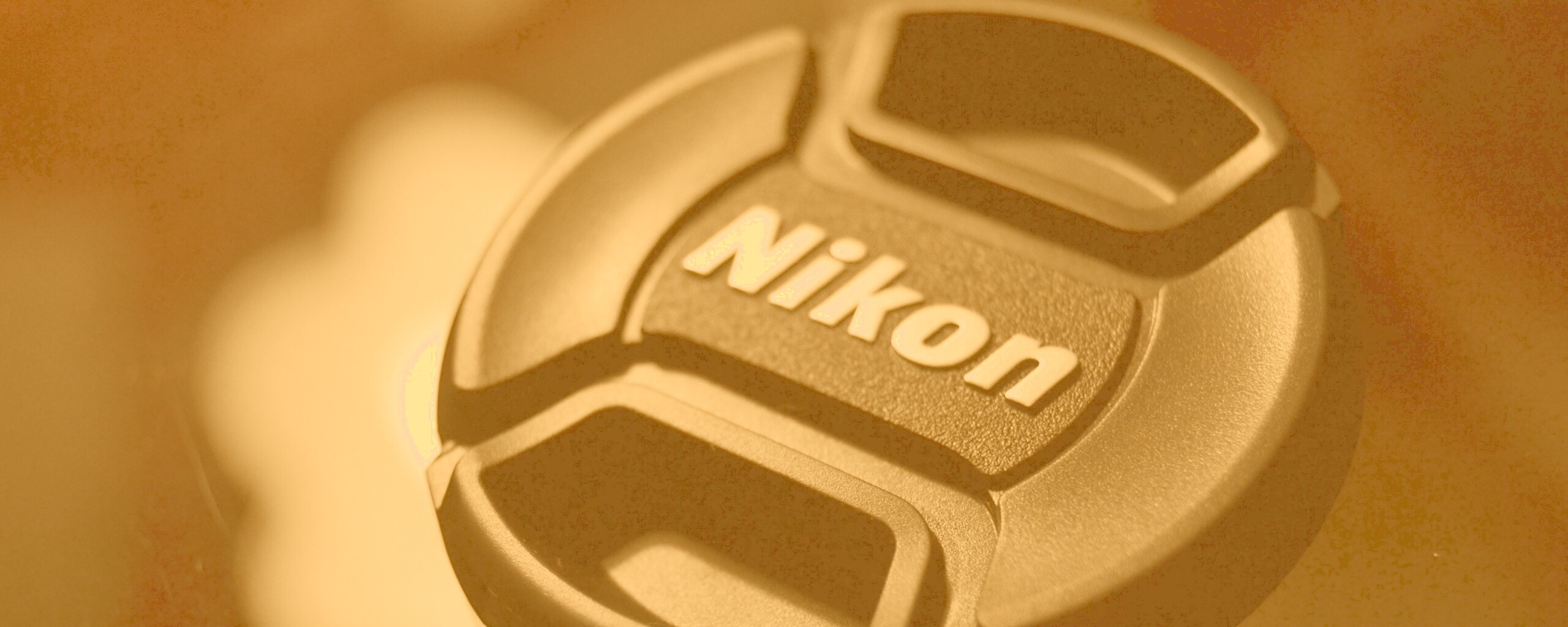 Крышечка от объектива Nikon обои