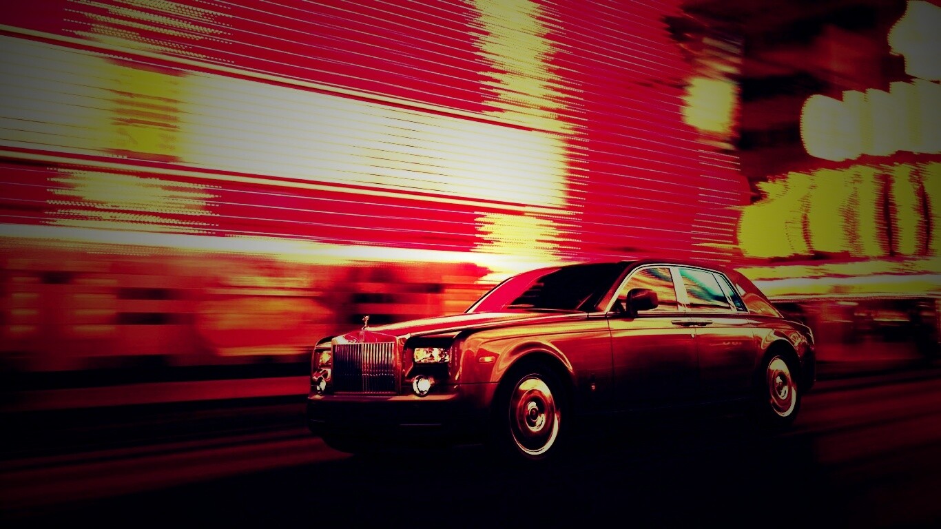 Rolls-Royce Phantom едет через город обои