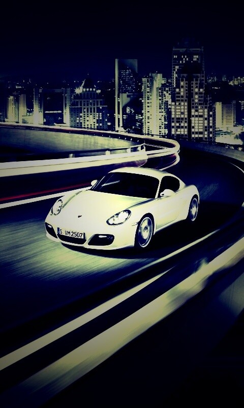 Черный и белый Porsche на автомагистрале. обои