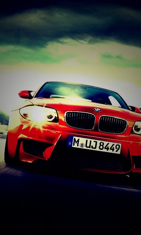 Оранжевый BMW M1 Coupe на треке обои