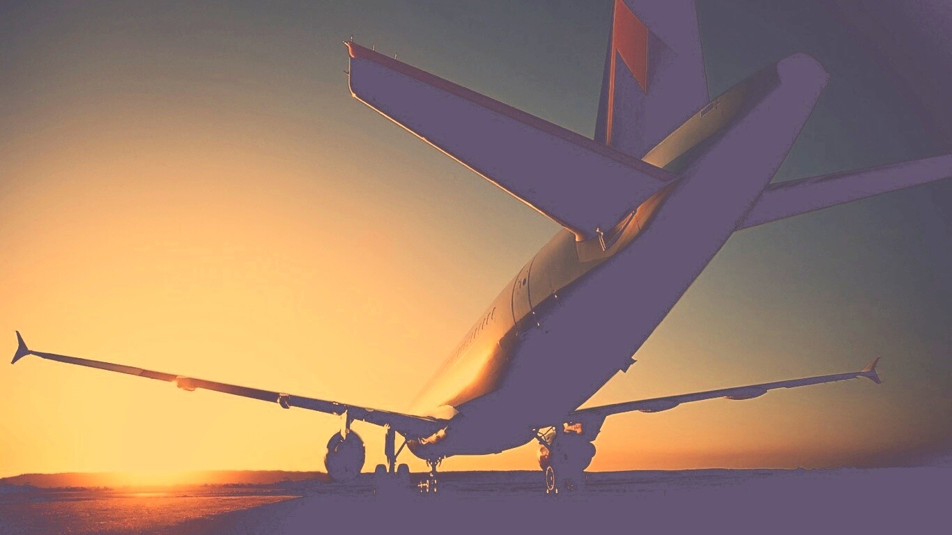 Самолет на закате обои