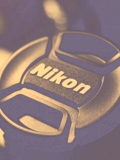 Крышечка от объектива Nikon обои