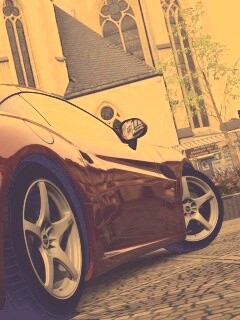 Ferrari на мостовой обои