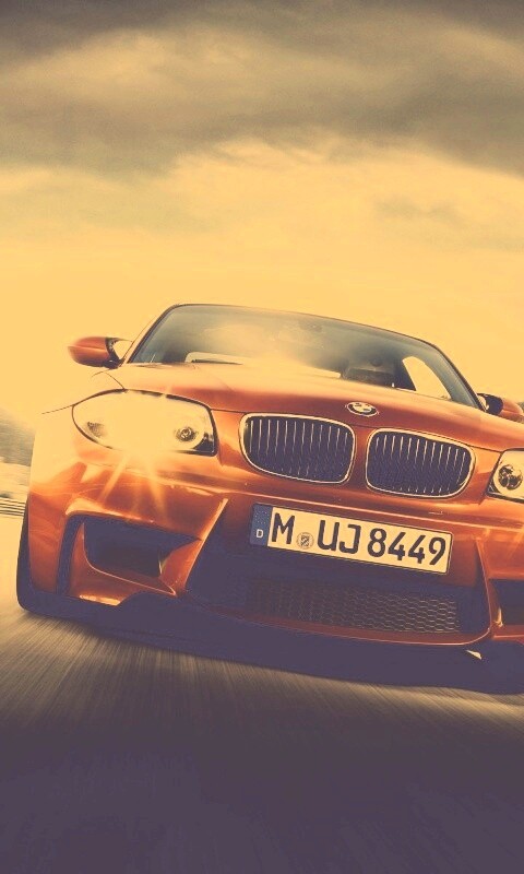 Оранжевый BMW M1 Coupe на треке обои