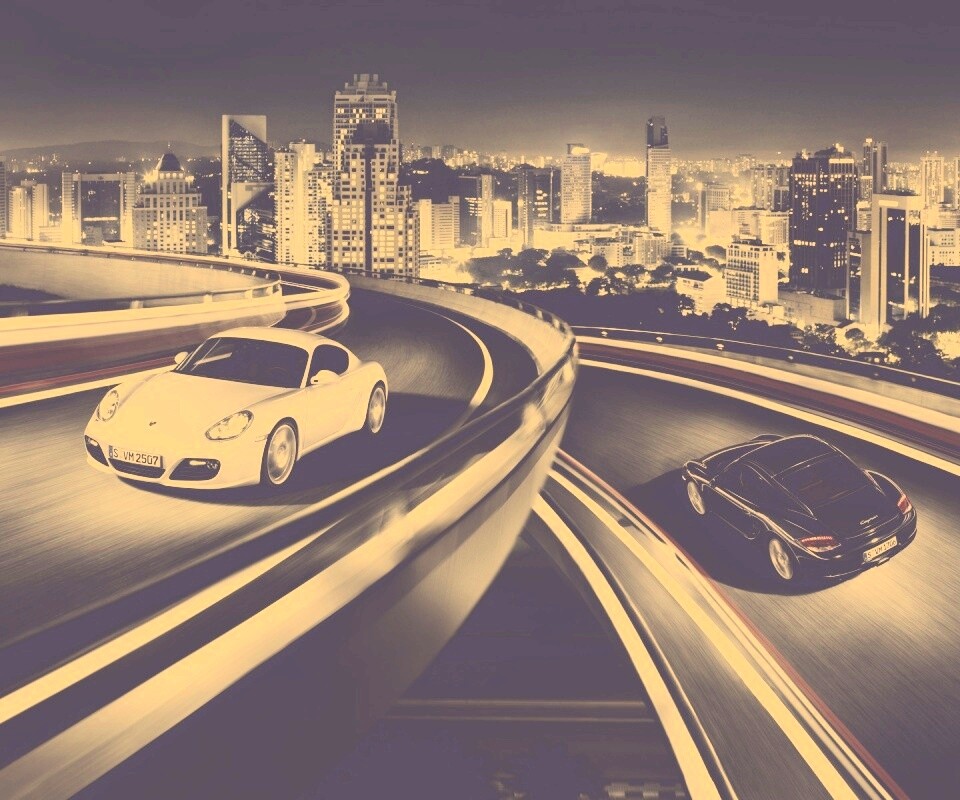 Черный и белый Porsche на автомагистрале. обои