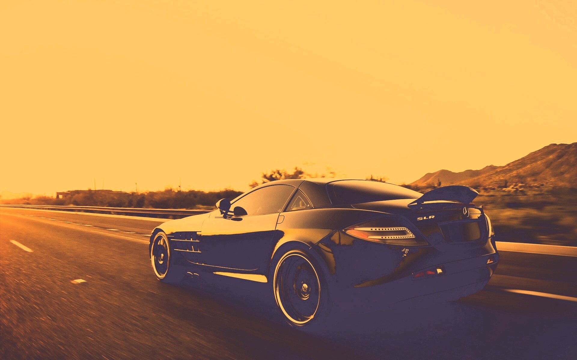 Черный автомобиль уезжает в закат обои