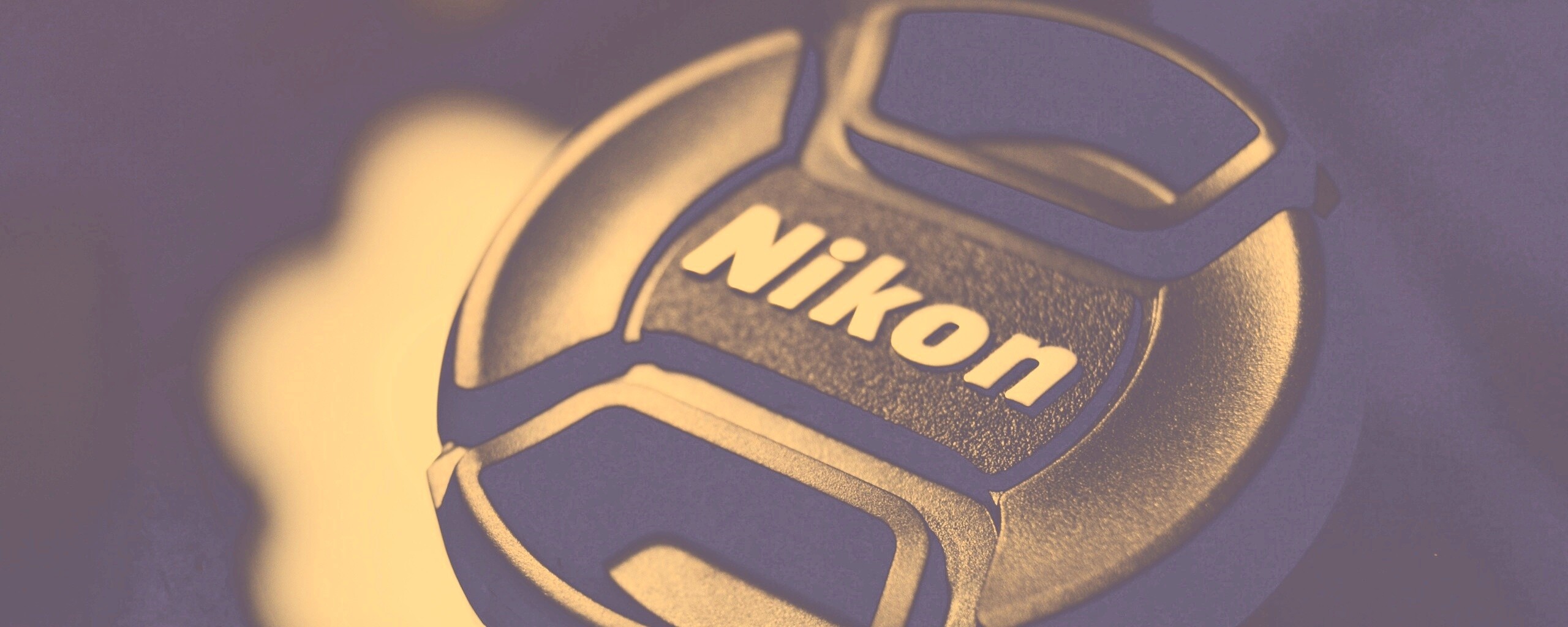 Крышечка от объектива Nikon обои