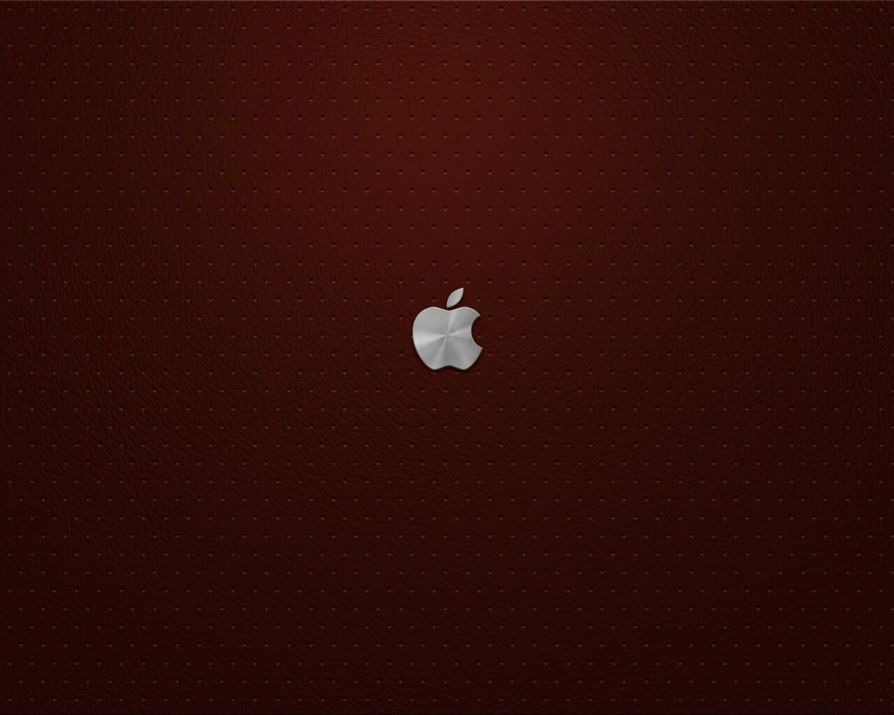 Маленький логотип Apple на перфорированной коже обои
