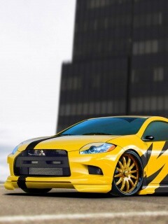 Mitsubishi жёлтого цвета с черными полосами обои