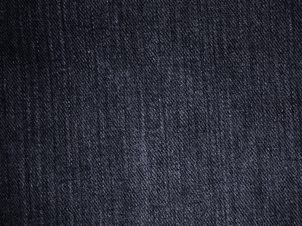 Цвет темных джинс. Черная джинсовая ткань. Джинсы текстура. Фактура джинсовой ткани. Черная джинса ткань.