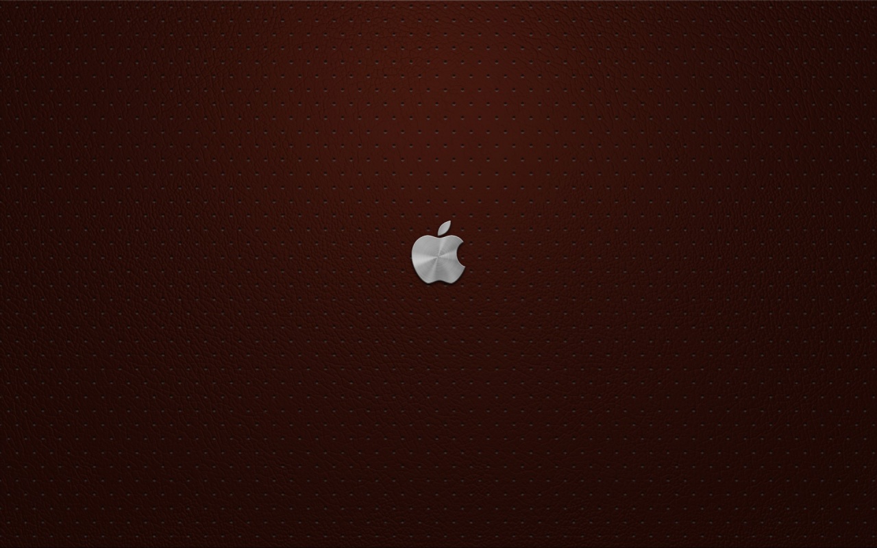 Маленький логотип Apple на перфорированной коже обои