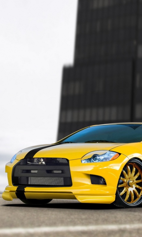 Mitsubishi жёлтого цвета с черными полосами обои